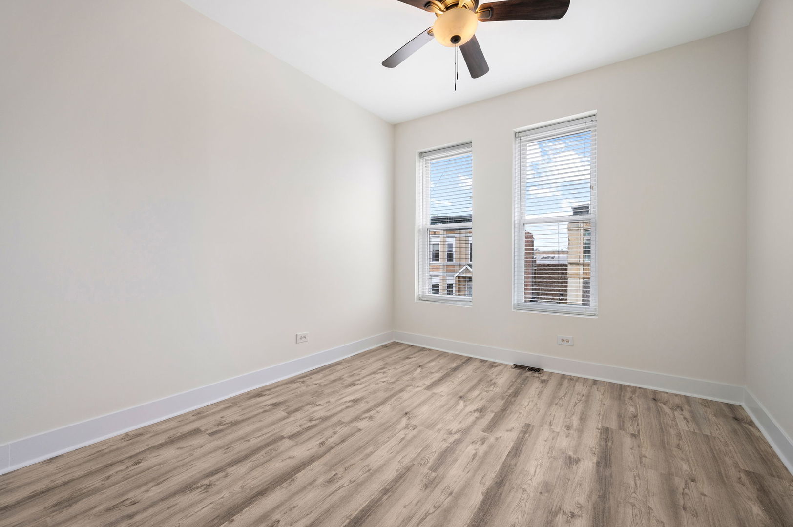 2756 West Monroe Street Chicago, IL 60612 - Photo 34 of 52 wooden floor in an empty room with a window