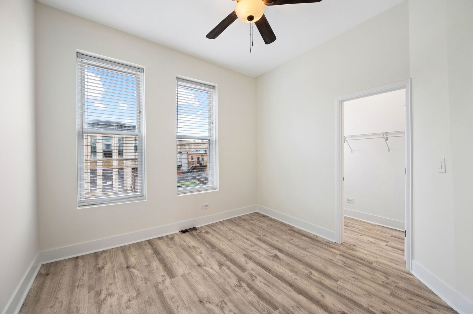 2756 West Monroe Street Chicago, IL 60612 - Photo 35 of 52 wooden floor in an empty room with a window