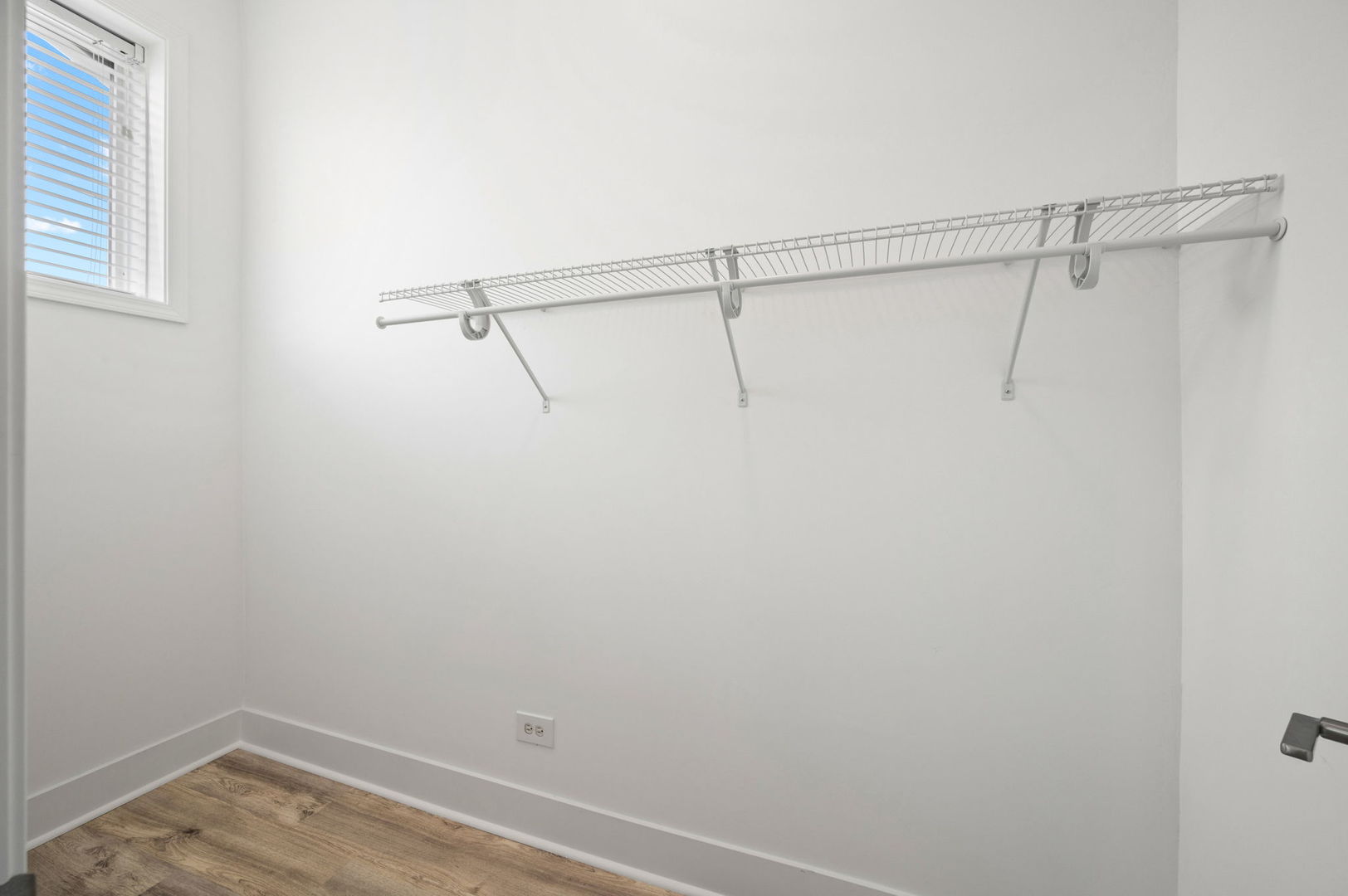 2756 West Monroe Street Chicago, IL 60612 - Photo 36 of 52 a view of a room with racks on the wall