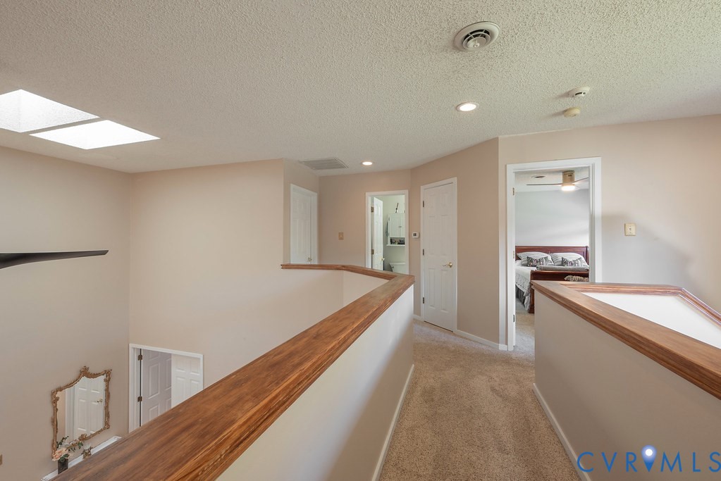 2602 Cox Road Henrico, VA 23233 - Photo 33 of 50 a large kitchen with a lot of counter space and wooden floor