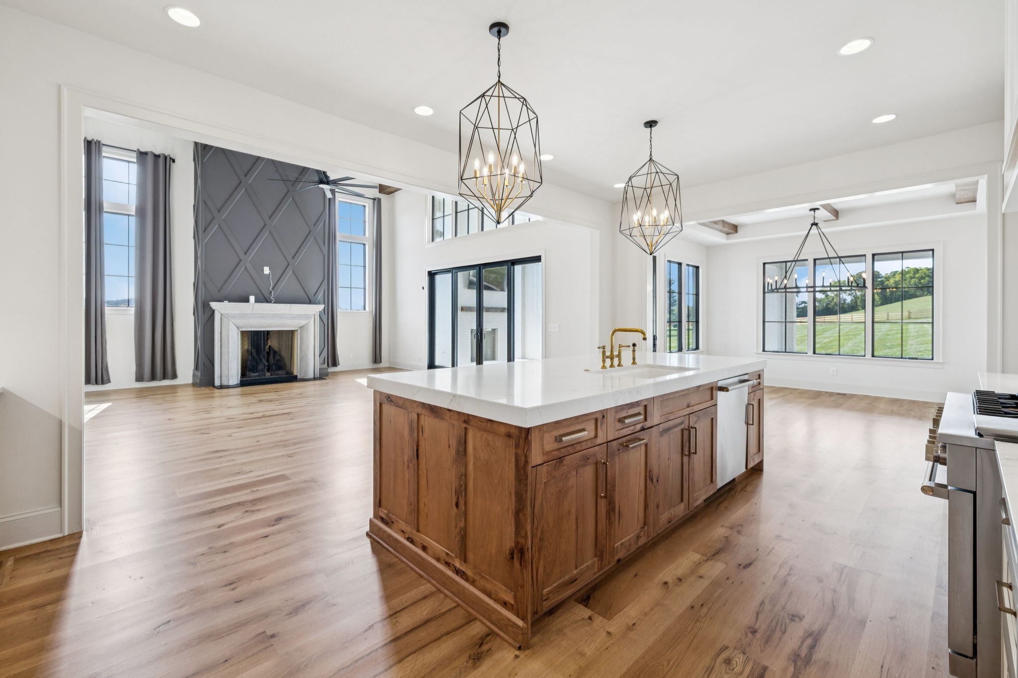 2245 Skinner Road Arrington, TN 37014 - Photo 38 of 98 a large kitchen with kitchen island wooden floor and stainless steel appliances