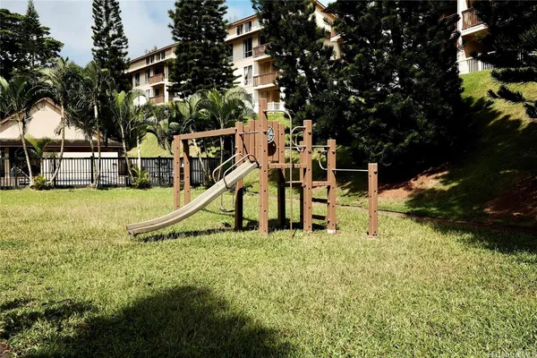 a view of a house with a park