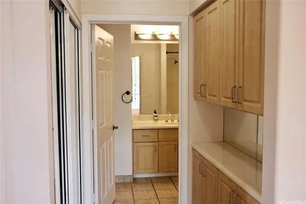 a bathroom with a shower and a sink