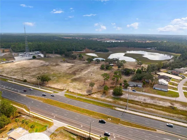 a view of a swimming pool with an outdoor seating