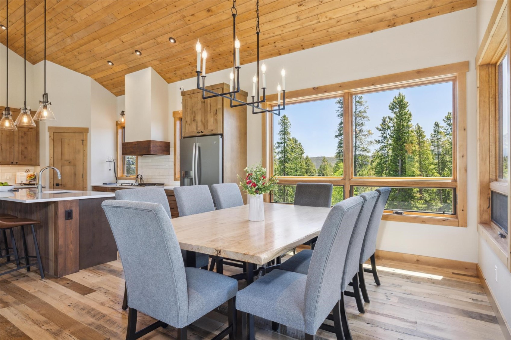 41 Barton Ridge Drive Breckenridge, CO 80424 - Photo 12 of 47 a view of a dining room with furniture window and wooden floor