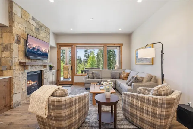 a bedroom with a bed and a fireplace