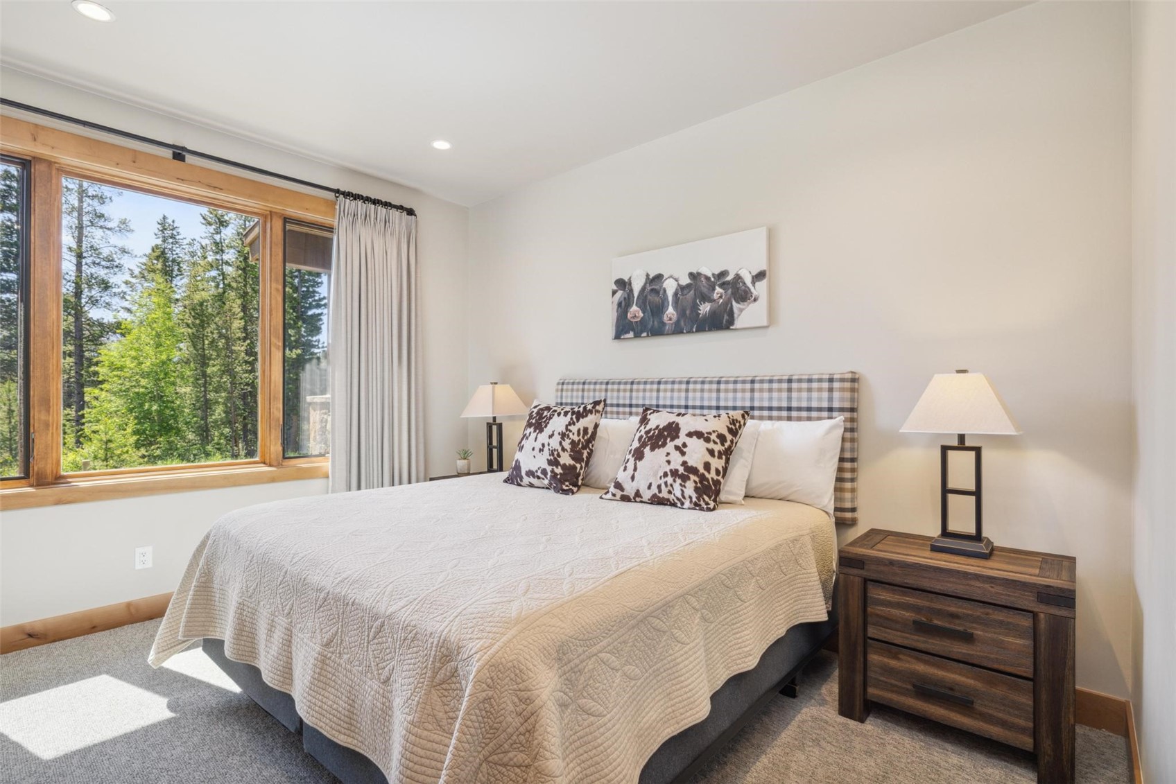 41 Barton Ridge Drive Breckenridge, CO 80424 - Photo 19 of 47 a bedroom with bed and a large window