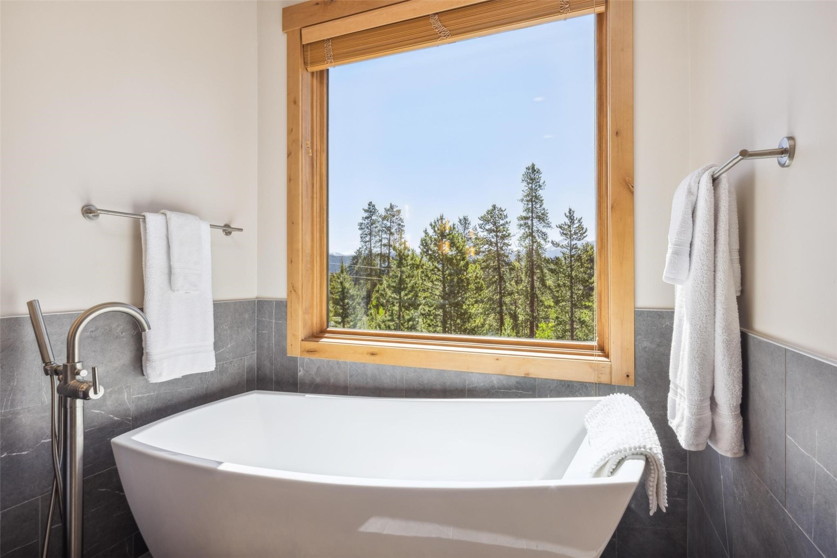 41 Barton Ridge Drive Breckenridge, CO 80424 - Photo 21 of 47 a white bath tub sitting next to a window