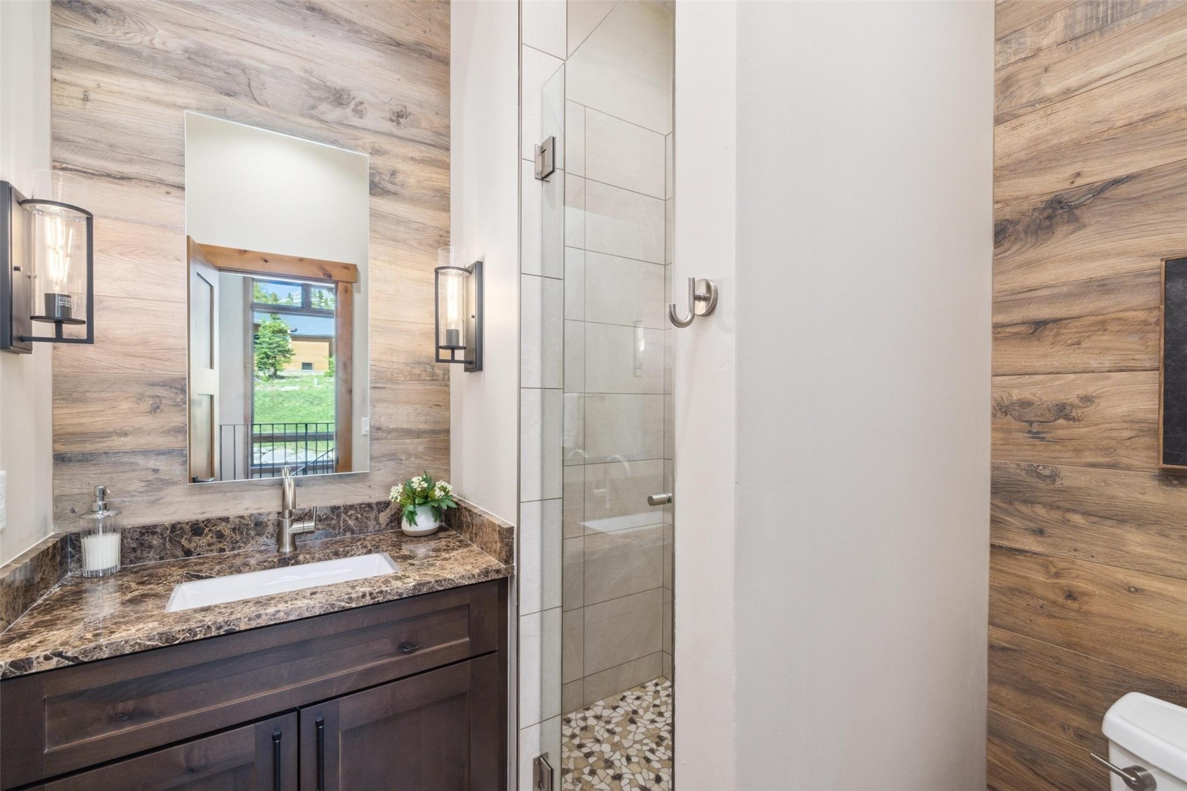 41 Barton Ridge Drive Breckenridge, CO 80424 - Photo 24 of 47 a bathroom with a granite countertop sink a toilet and shower