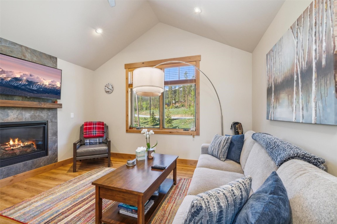 41 Barton Ridge Drive Breckenridge, CO 80424 - Photo 35 of 42 a living room with furniture and a fireplace