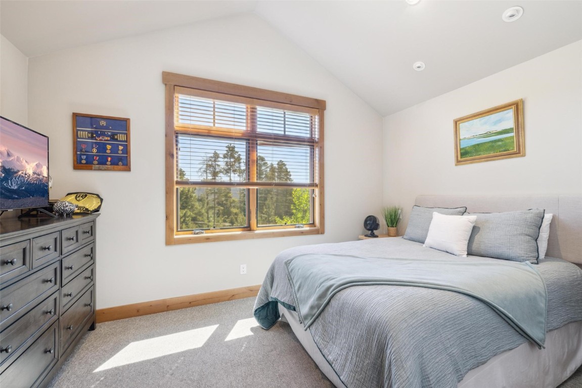 41 Barton Ridge Drive Breckenridge, CO 80424 - Photo 39 of 42 a bedroom with a bed and a window