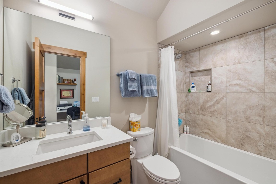 41 Barton Ridge Drive Breckenridge, CO 80424 - Photo 40 of 42 a bathroom with a sink toilet and shower
