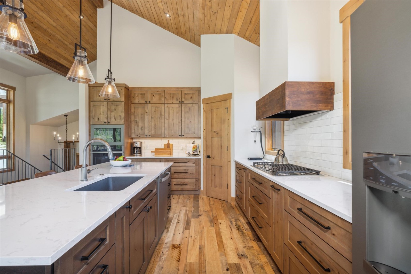 41 Barton Ridge Drive Breckenridge, CO 80424 - Photo 9 of 47 a kitchen with a sink stove and refrigerator