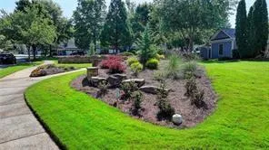 a garden view with a seating space