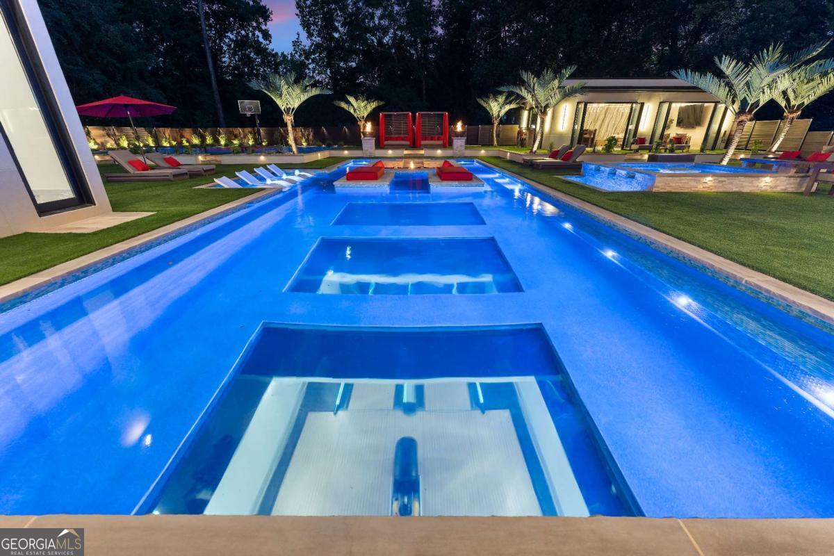 1386 Moores Mill Road Northwest Atlanta, GA 30327 - Photo 6 of 58 a view of an outdoor space