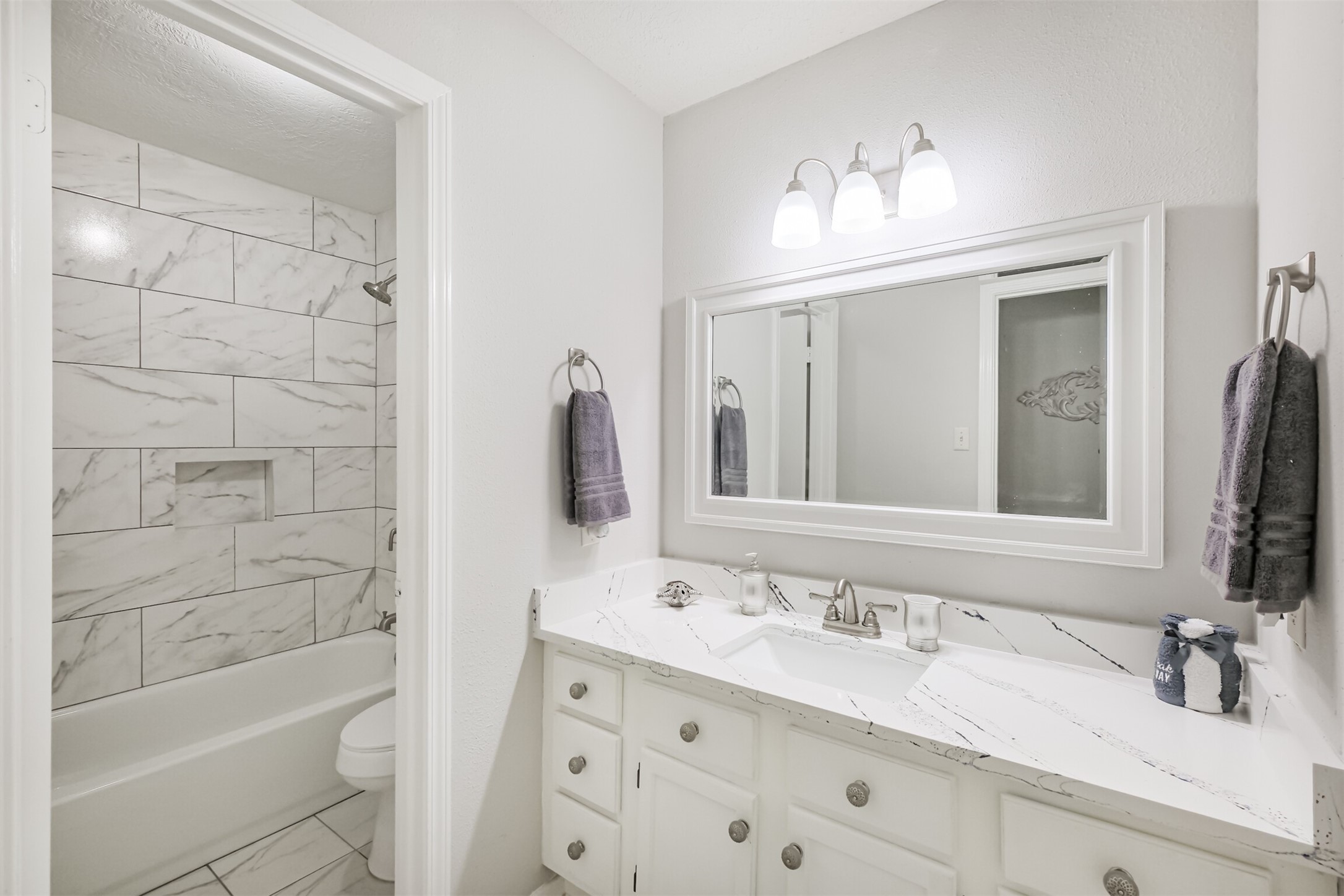 2705 Parrott Avenue Rosenberg, TX 77471 - Photo 24 of 37 a bathroom with a sink double vanity granite tub and a mirror