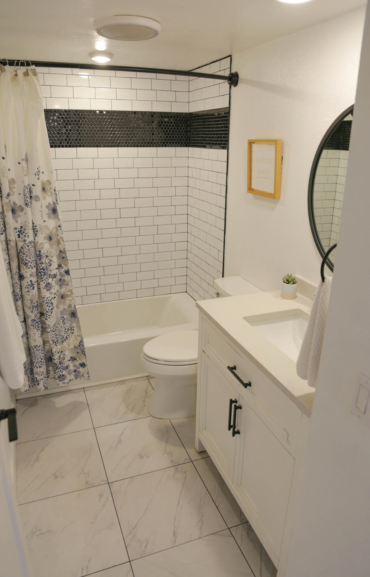 325 Ladera Street, Unit 5 Santa Barbara, CA 93101 - Photo 11 of 16 a bathroom with a sink a toilet and shower