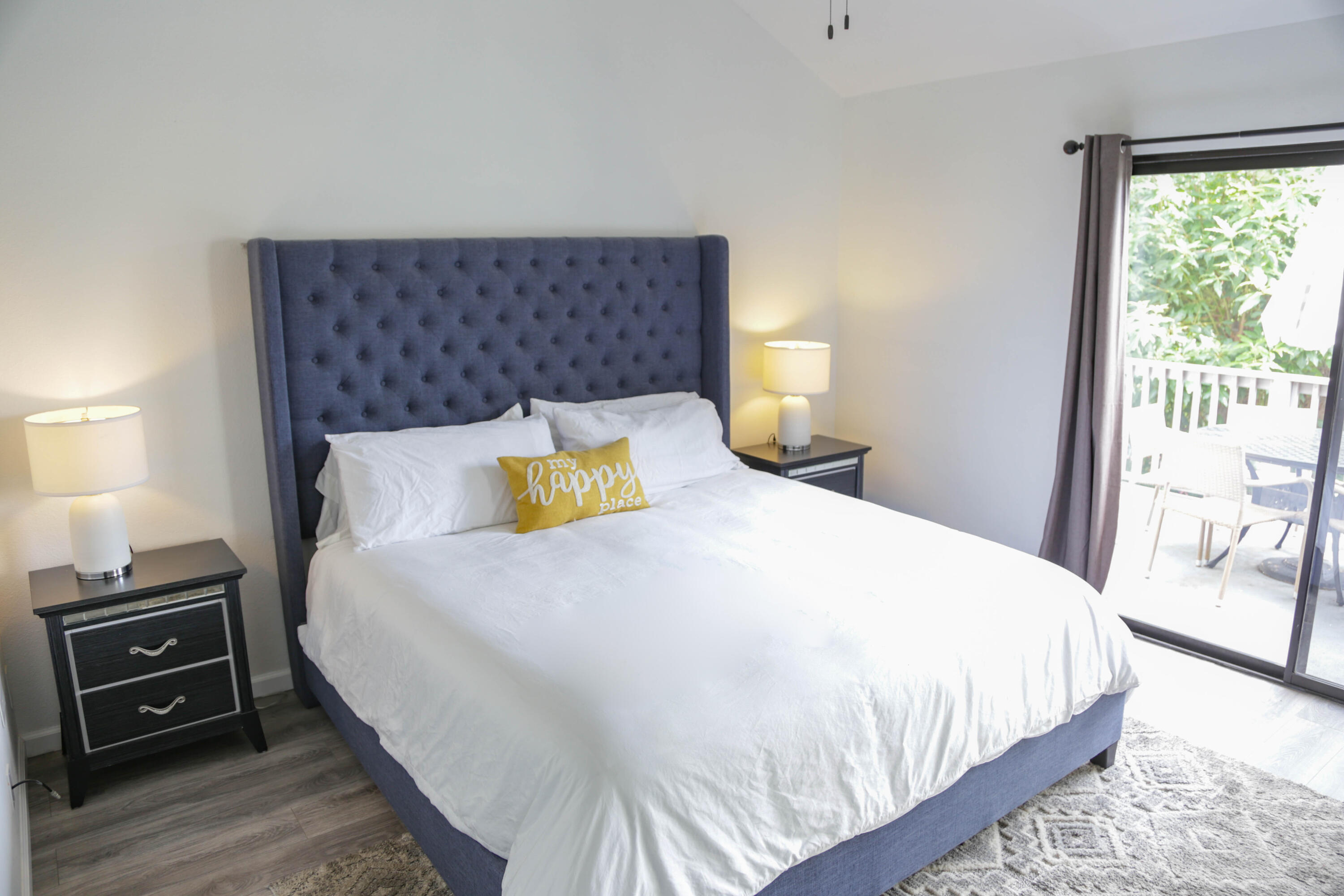 325 Ladera Street, Unit 5 Santa Barbara, CA 93101 - Photo 12 of 16 a bedroom with a bed and a tv