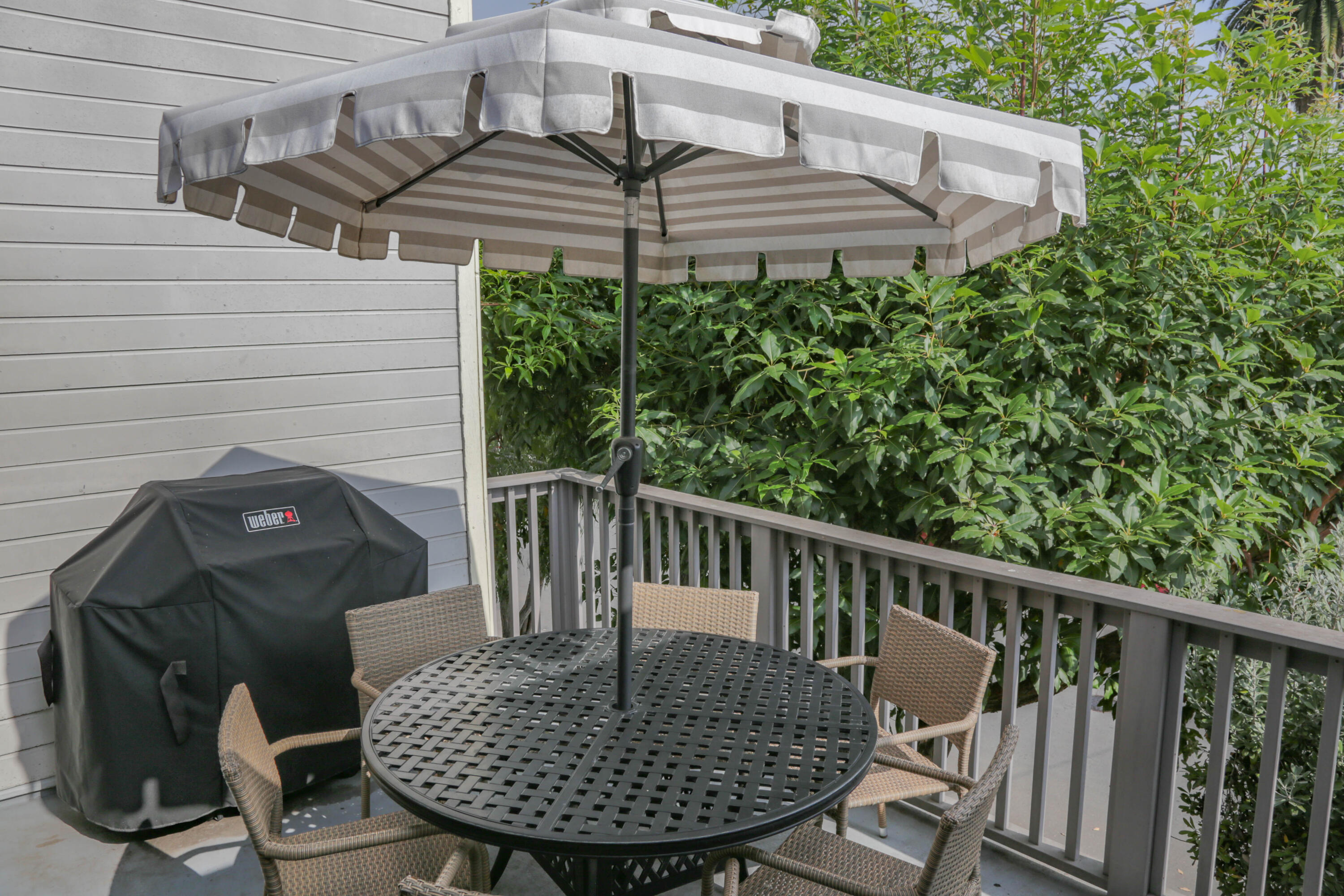 325 Ladera Street, Unit 5 Santa Barbara, CA 93101 - Photo 15 of 16 a view of balcony with wooden floor and outdoor seating