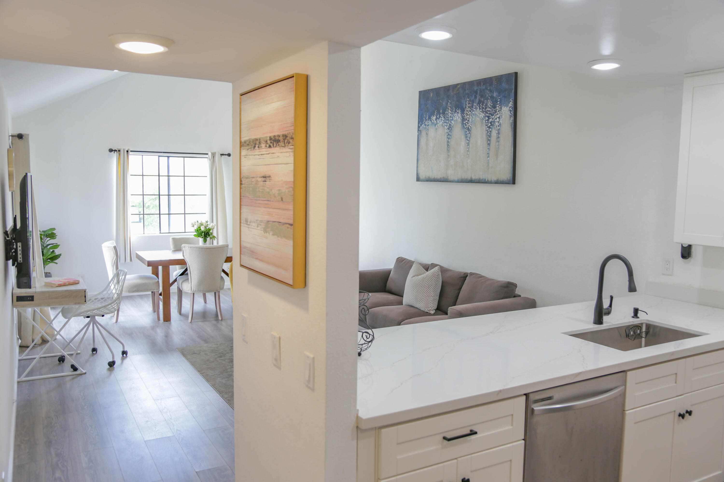 325 Ladera Street, Unit 5 Santa Barbara, CA 93101 - Photo 2 of 16 a living room with furniture and wooden floor
