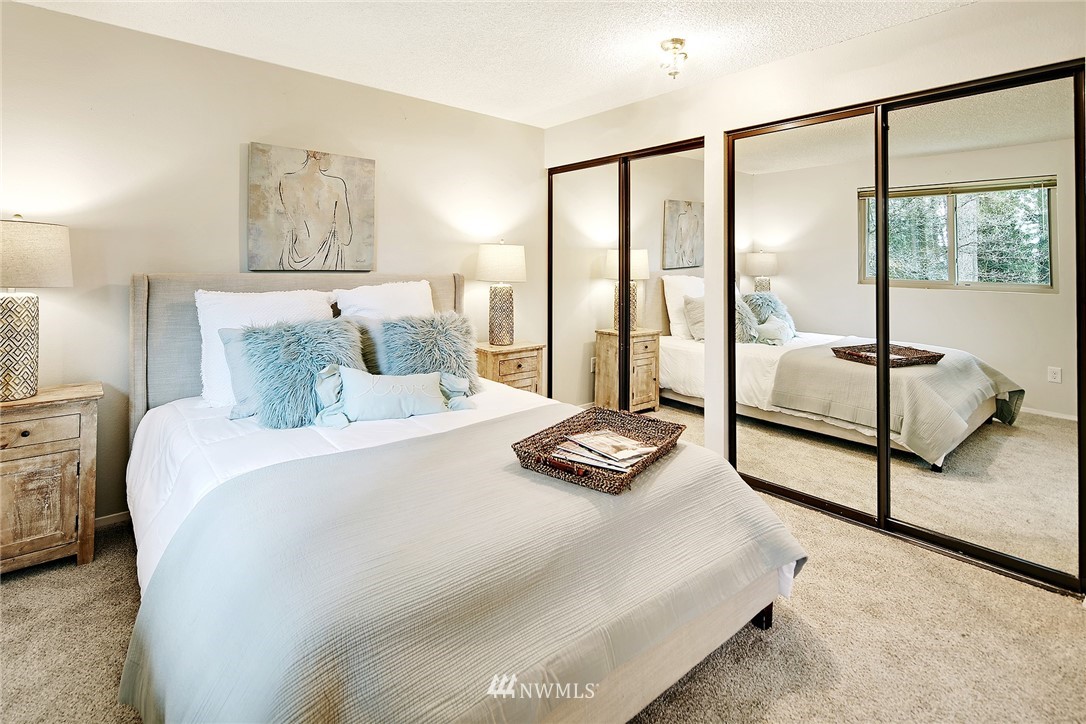 22605 1st Drive Southeast Bothell, WA 98021 - Photo 12 of 27 a bedroom with bed and large window