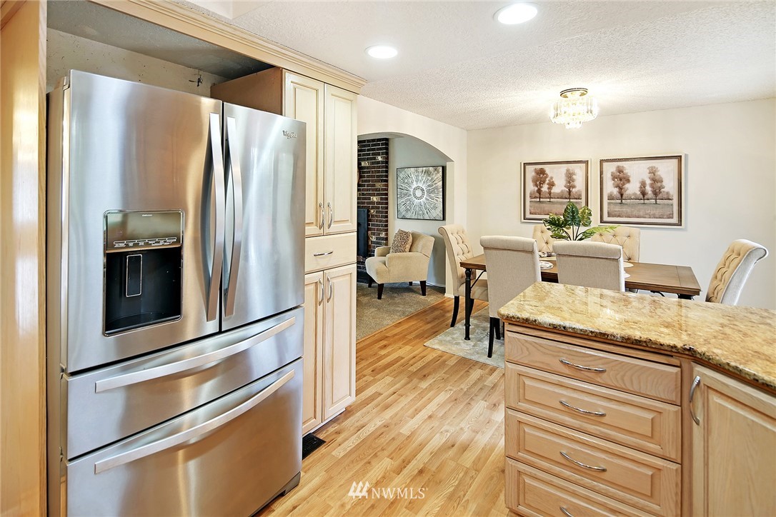 22605 1st Drive Southeast Bothell, WA 98021 - Photo 8 of 27 a living room with stainless steel appliances furniture and a kitchen view