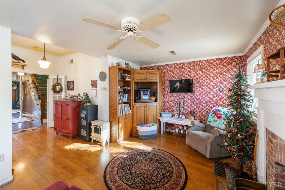 601 Henry Street Gretna, VA 24557 - Photo 16 of 46 a living room with furniture and a rug