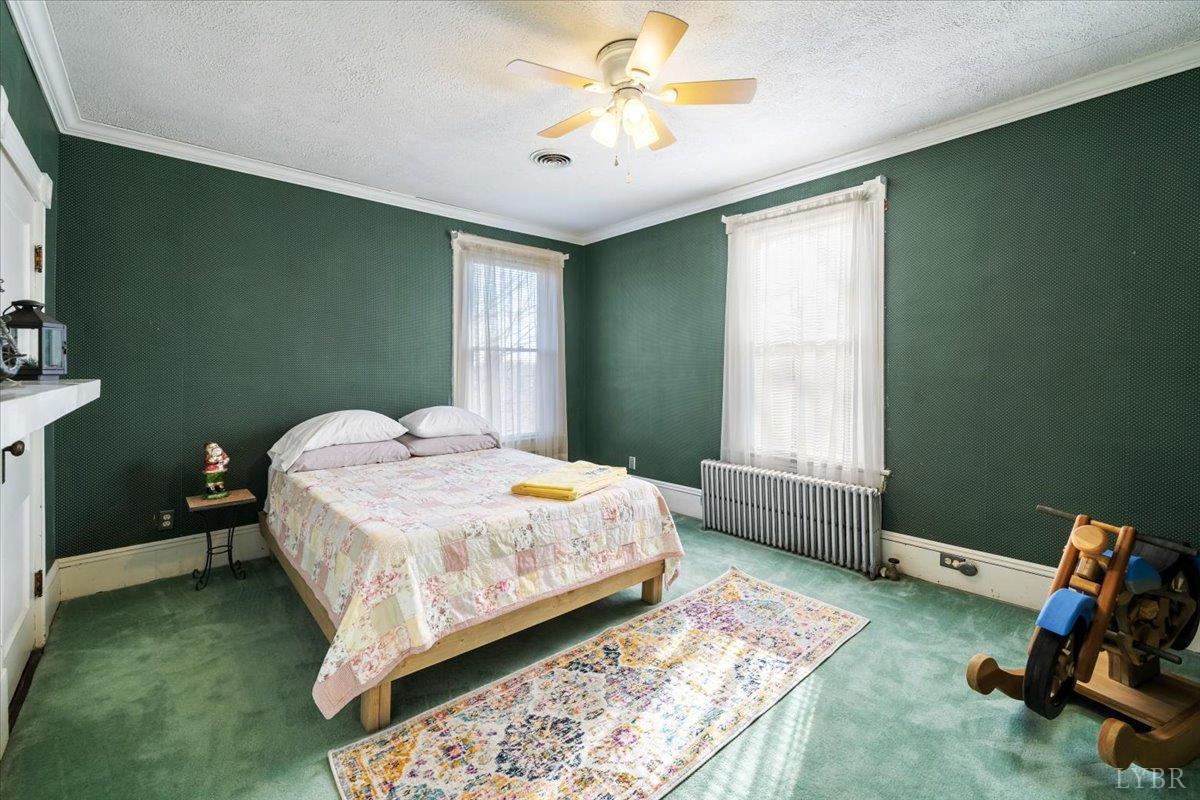 601 Henry Street Gretna, VA 24557 - Photo 33 of 46 a bedroom with a bed and a window