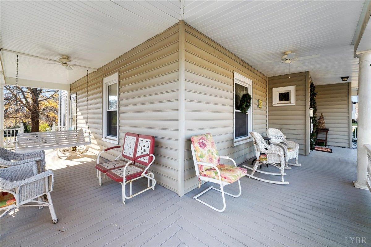 601 Henry Street Gretna, VA 24557 - Photo 35 of 46 a outdoor space with a large window and sitting chairs