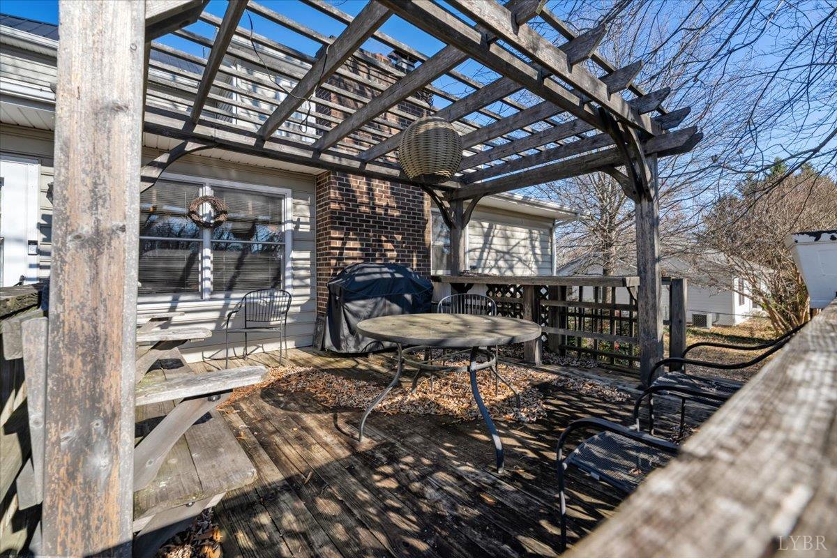 601 Henry Street Gretna, VA 24557 - Photo 36 of 46 a sitting area with furniture and wooden floor