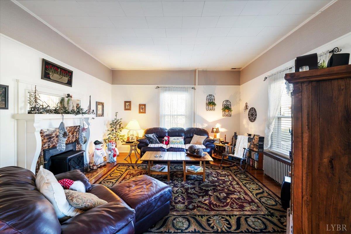 601 Henry Street Gretna, VA 24557 - Photo 4 of 46 a living room with furniture and a window