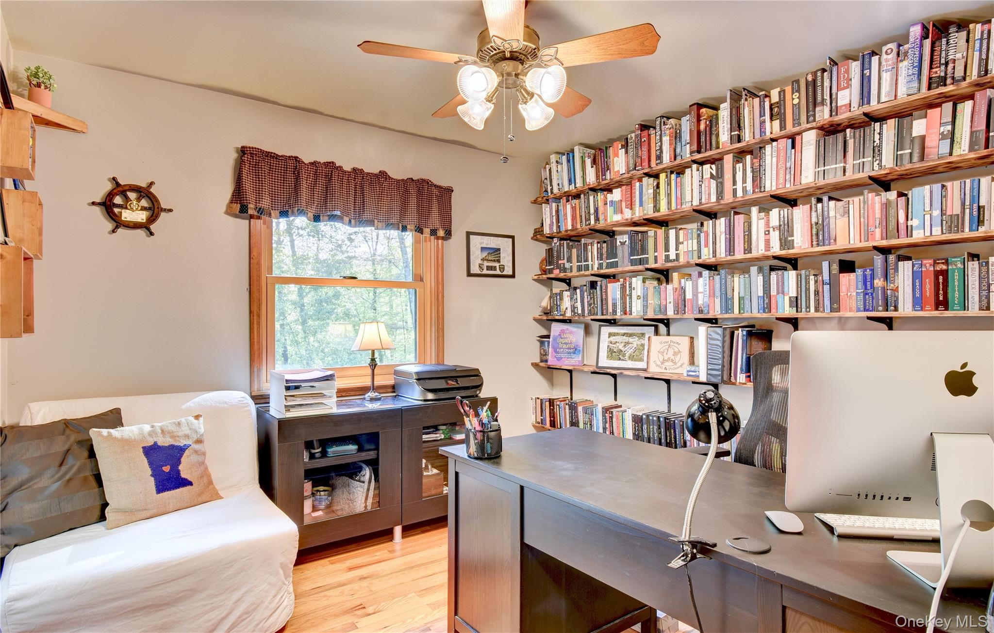 29 Valley View Road Bloomingburg, NY 12721 - Photo 18 of 50 a view of a workspace with furniture and a bookshelf