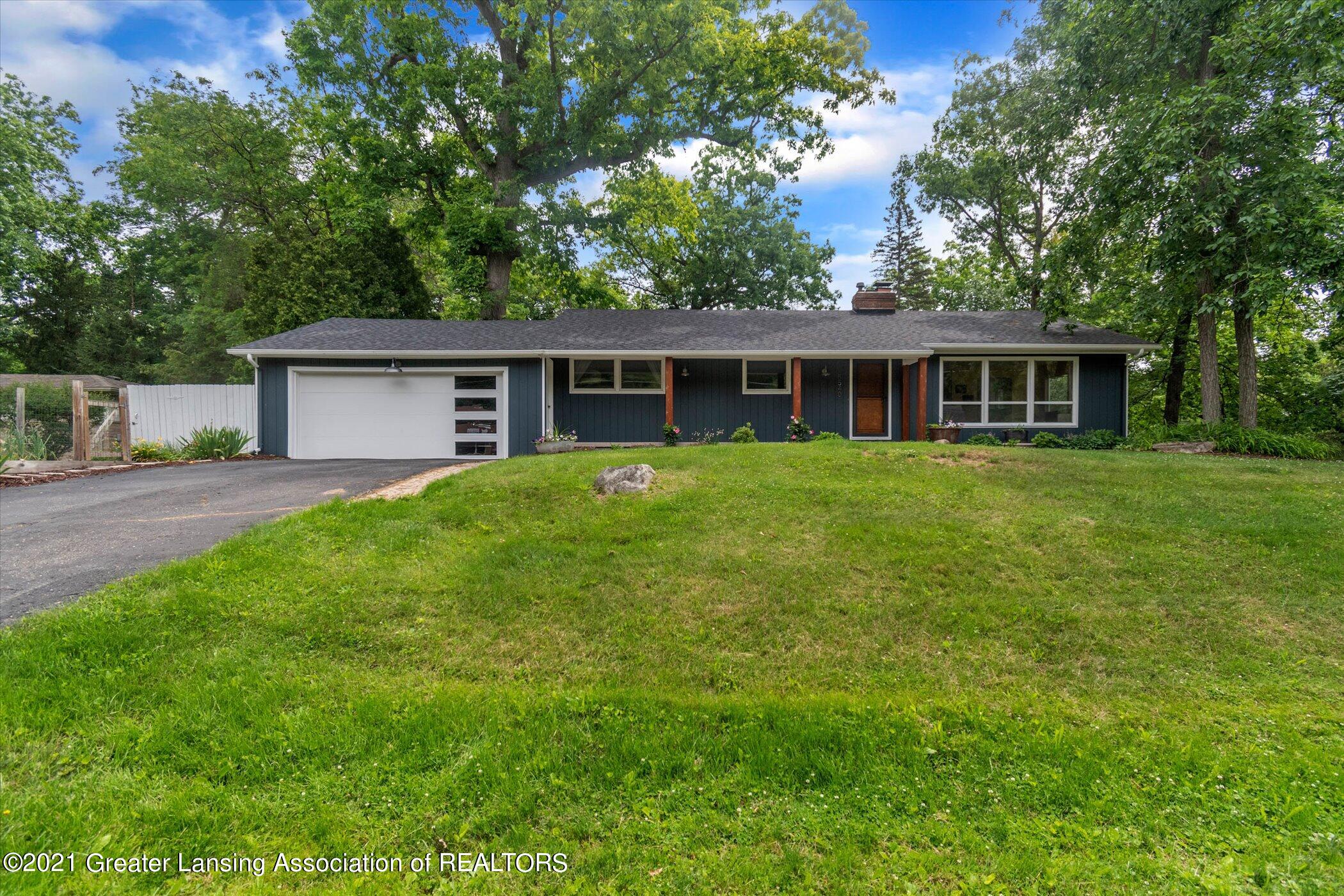 5540 Woodville Road Haslett, MI 48840 - Photo 3 of 43 03-5540 Woodville Rd-WindowStill-Real-Es