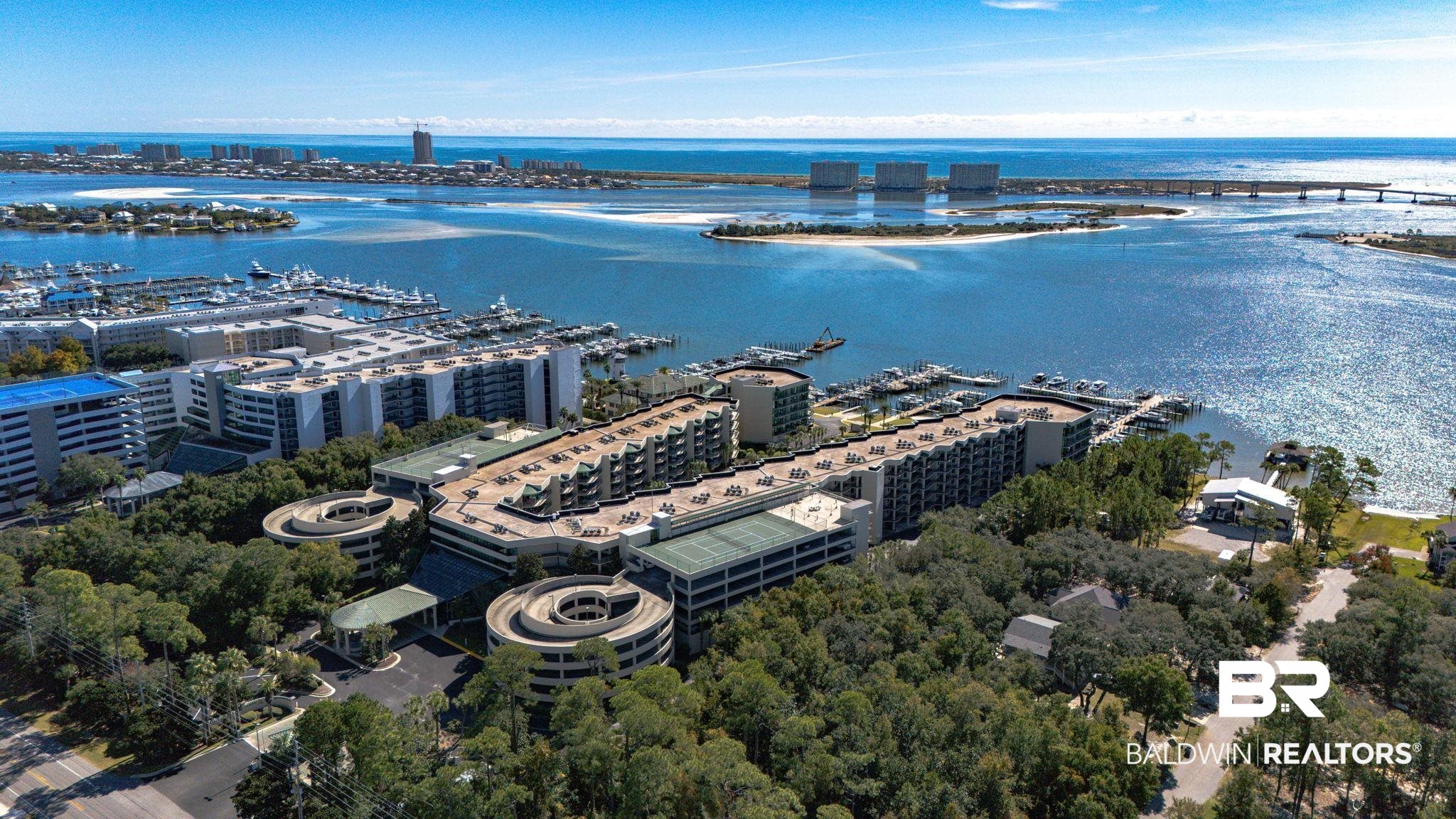 27580 Canal Road, Unit 1526 Orange Beach, AL 36561 - Photo 4 of 49 Drone / aerial view of a nearby body of water