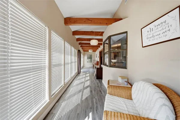 a view of a living room and bathroom