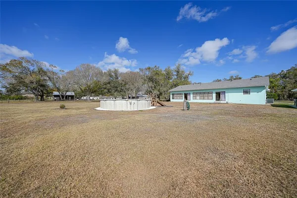 a view of backyard of house