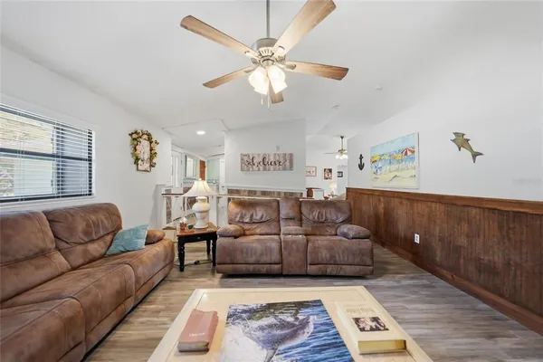 a living room with furniture and a rug