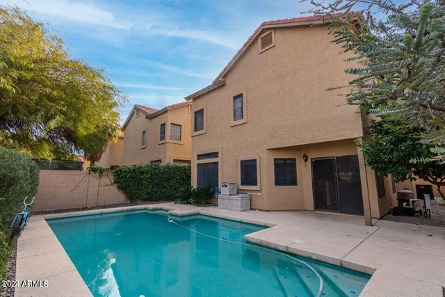a house view with a outdoor space