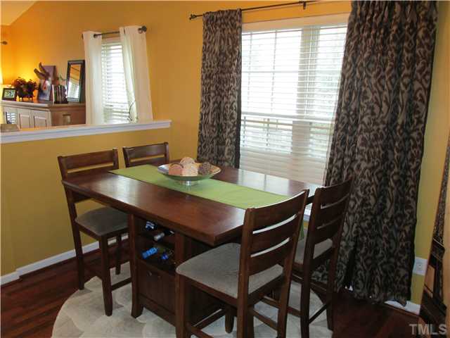 5429 Kassia Lane Raleigh, NC 27616 - Photo 11 of 20 a view of a dining room with furniture and window