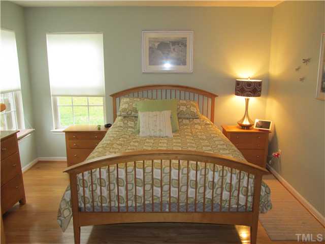 5429 Kassia Lane Raleigh, NC 27616 - Photo 13 of 20 a bedroom with a bed and a window