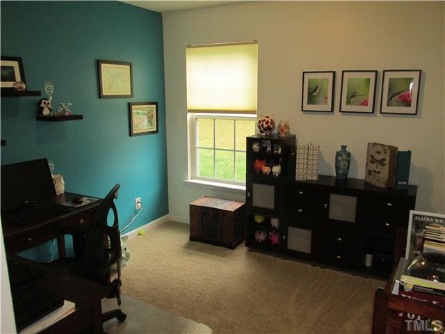 5429 Kassia Lane Raleigh, NC 27616 - Photo 15 of 20 a room with furniture and a window