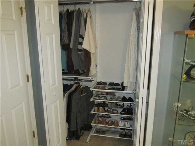 5429 Kassia Lane Raleigh, NC 27616 - Photo 20 of 20 a view of walk in closet with clothes and shoes
