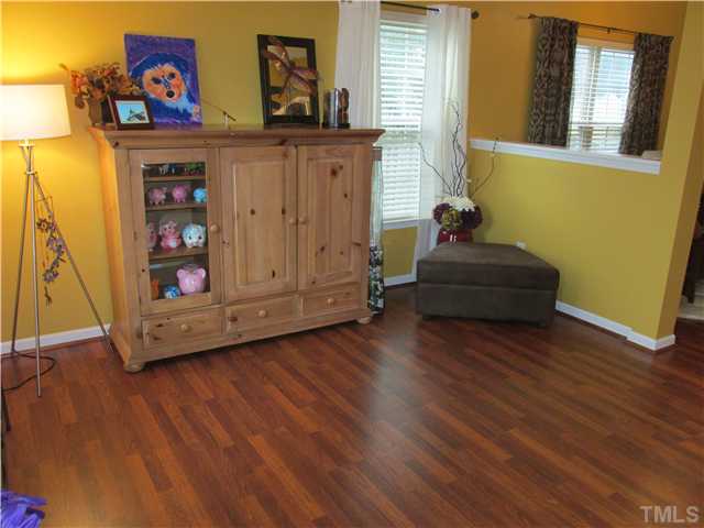 5429 Kassia Lane Raleigh, NC 27616 - Photo 3 of 20 a living room with furniture and a wooden floor