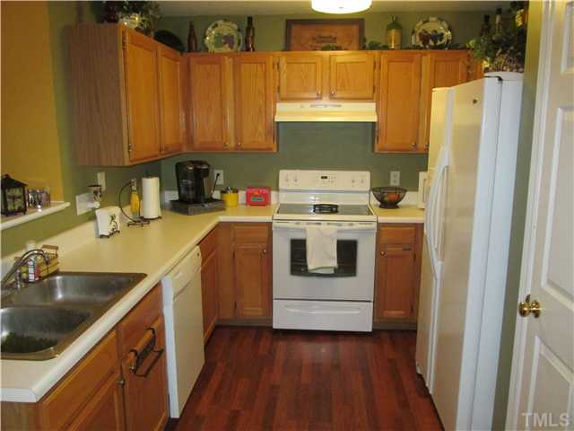 5429 Kassia Lane Raleigh, NC 27616 - Photo 5 of 20 a utility room with sink dryer and washer