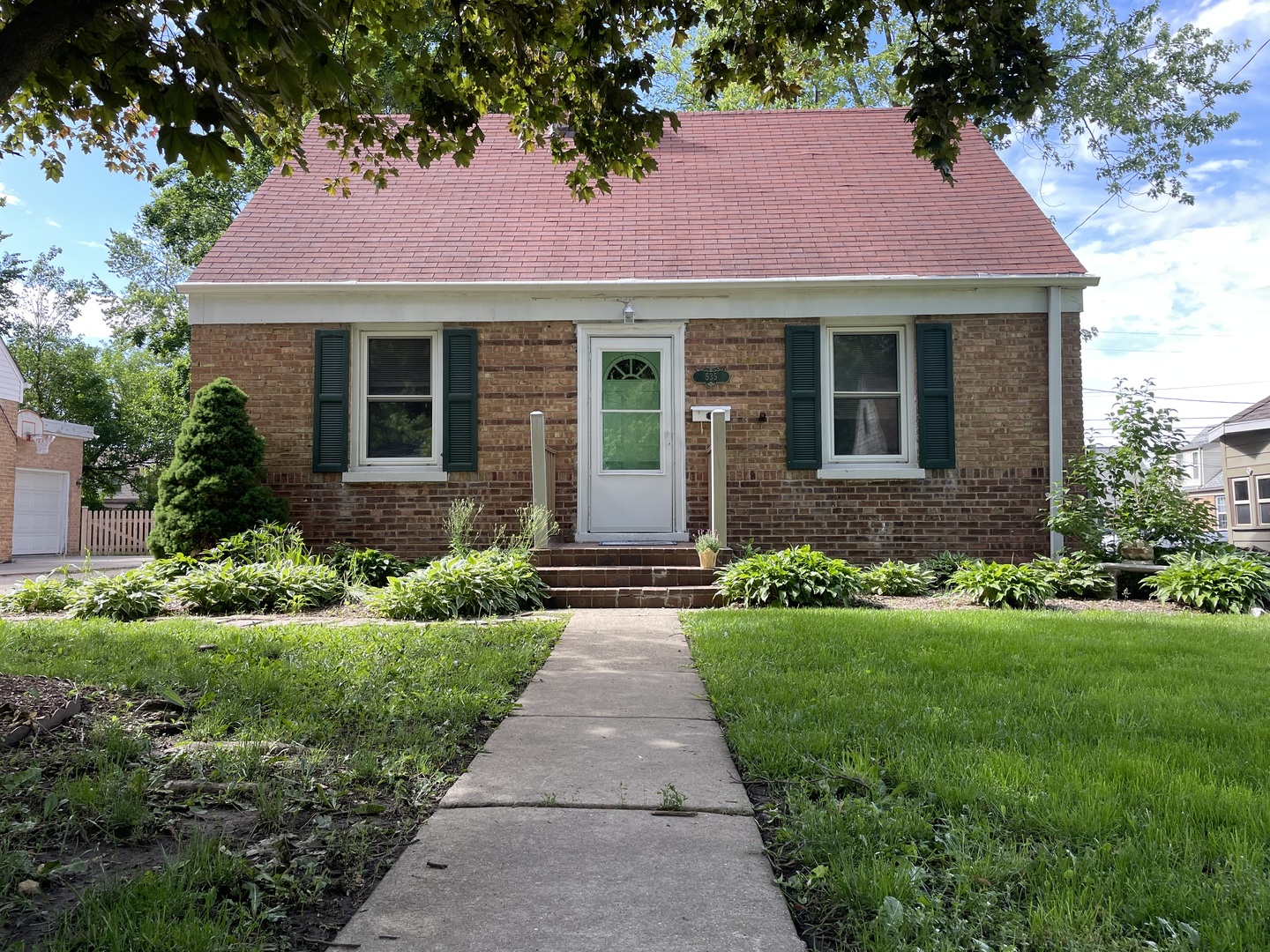 535 Kendall Lane DeKalb, IL 60115 - Photo 2 of 14 a front view of a house with yard and green space
