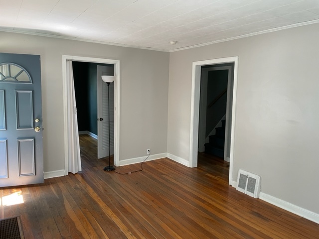 535 Kendall Lane DeKalb, IL 60115 - Photo 4 of 14 wooden floor in an empty room