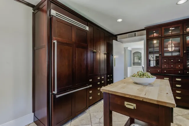 a bathroom with a sink and a large mirror