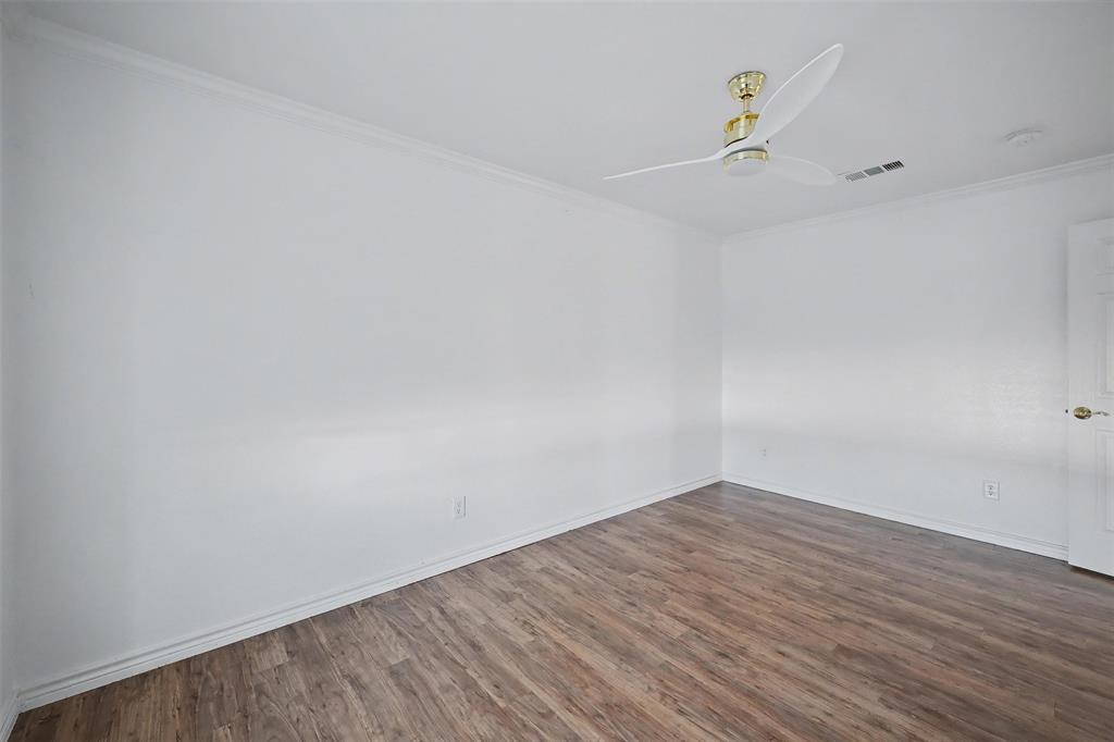 1781 South Munson Road Royse City, TX 75189 - Photo 14 of 33 a view of an empty room with wooden floor