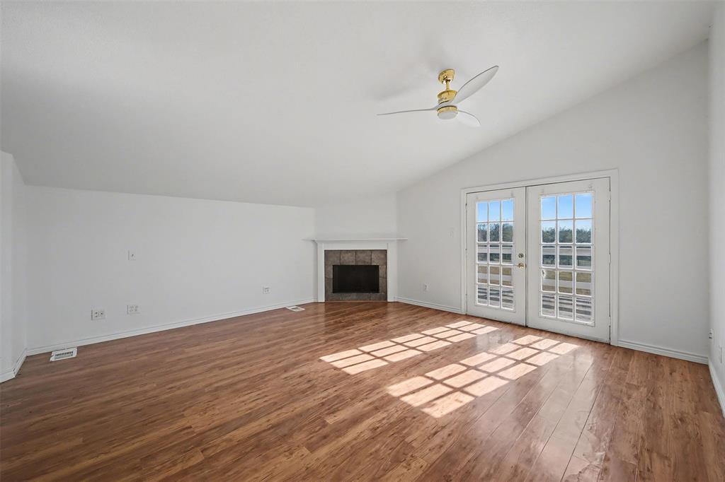 1781 South Munson Road Royse City, TX 75189 - Photo 18 of 33 a view of an empty room with wooden floor and a window