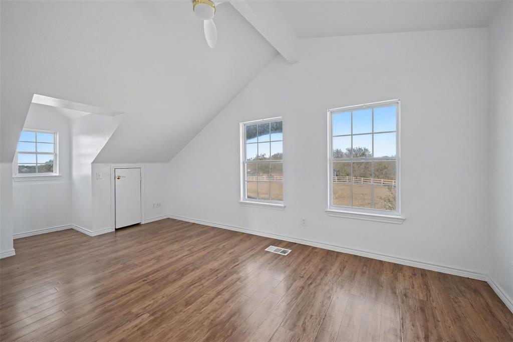 1781 South Munson Road Royse City, TX 75189 - Photo 24 of 33 an empty room with wooden floor and windows